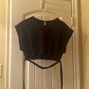 I am selling a Black Forever 21 crop top. Haven't been worn since I bought it.